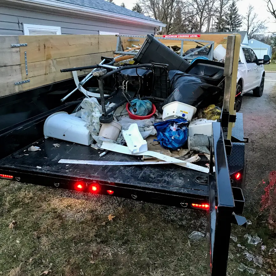Roll-off dumpster delivered to a residential driveway in Eden