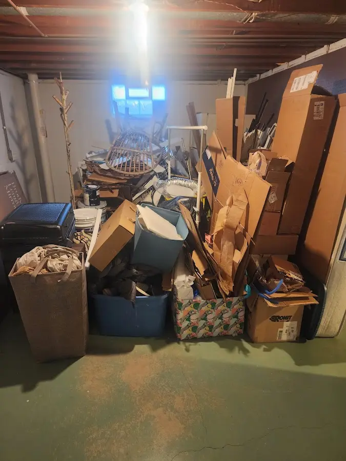 Roll-off dumpster container at job site for Construction Dumpster Rental in Eden